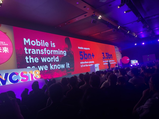 The keynote stage, displaying some big numbers.