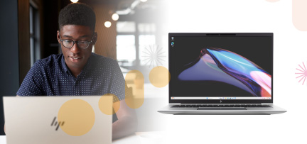 A person sitting at a desk working on a HP laptop