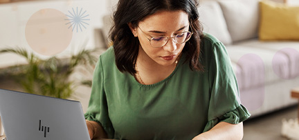A person using an HP laptop