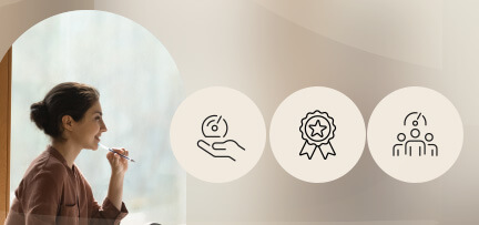 A person in a minimalist office with icons for icons for productivity and communication