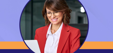An office worker using a Dell Pro 14 laptop in a moder office 